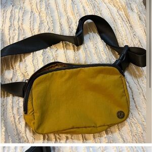 Authentic LuLuLemon Everywhere Belt Bag, mustard brown color l with black strap